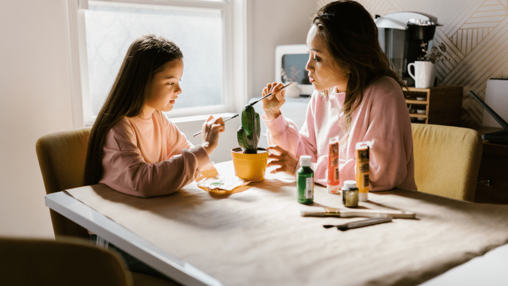 mother and child doing painting