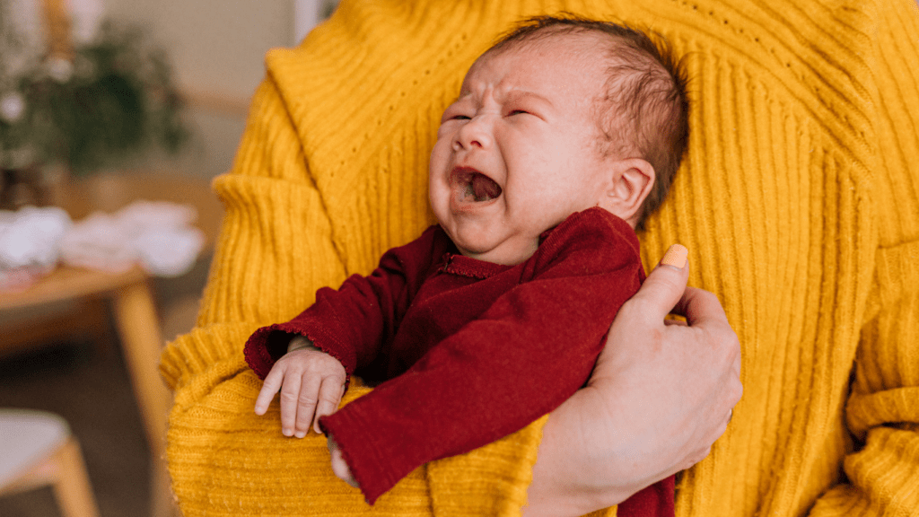 Holding a baby crying