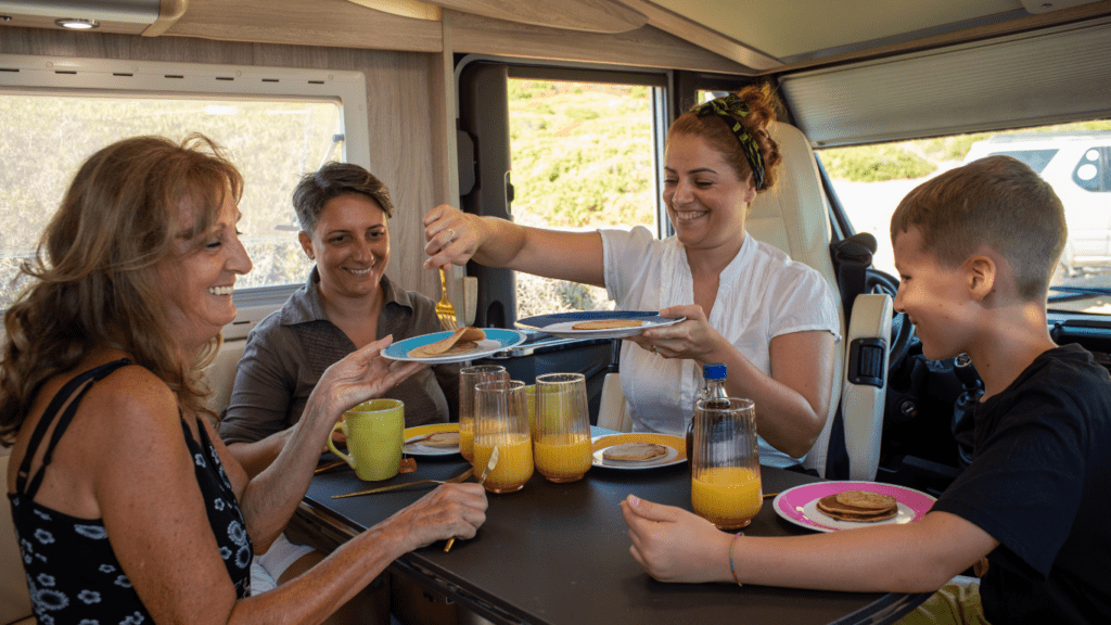 Family eating inside the RV
