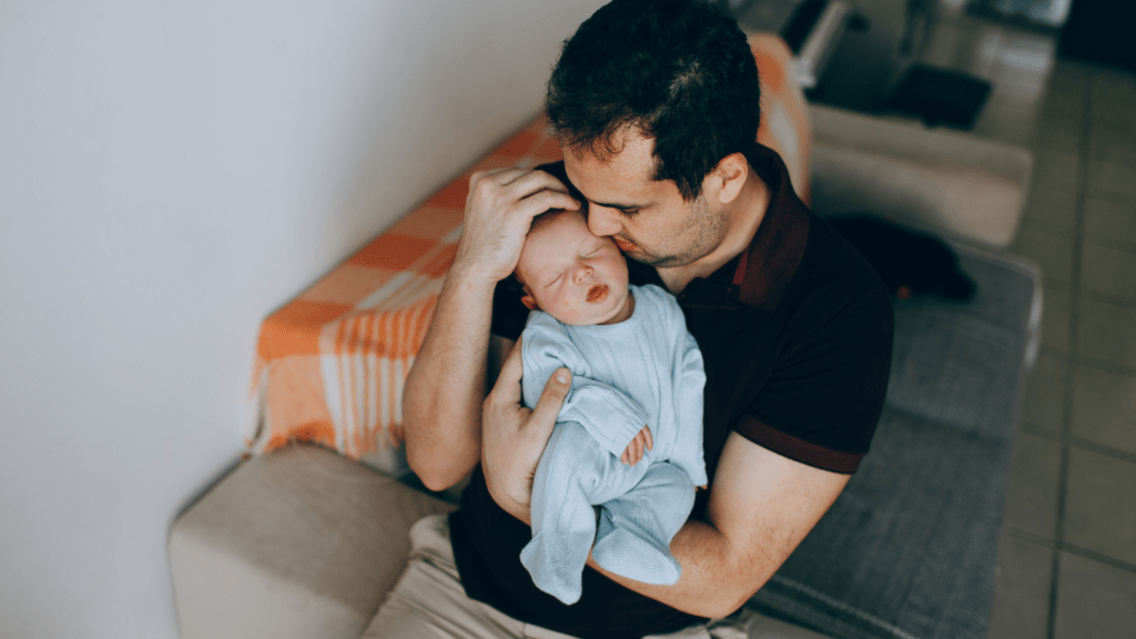 Father holding a baby